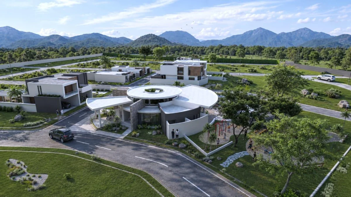 Vista aérea de la entrada y el club house de Shaddai-Jireh Residencial